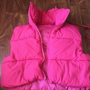 Cropped pink puffer vest